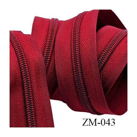 fermeture éclair de marque YKK au mètre couleur rouge un curseur au mètre largeur 27 mm largeur du zip 5 mm